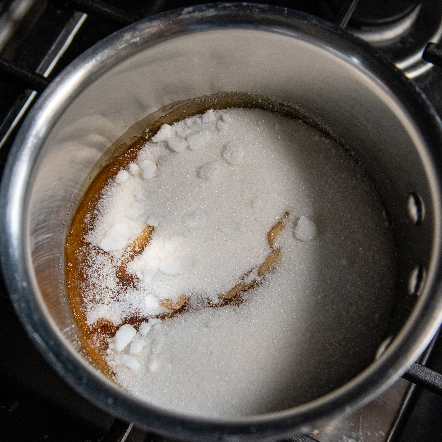 Caramel ingredients in a sauce pan.