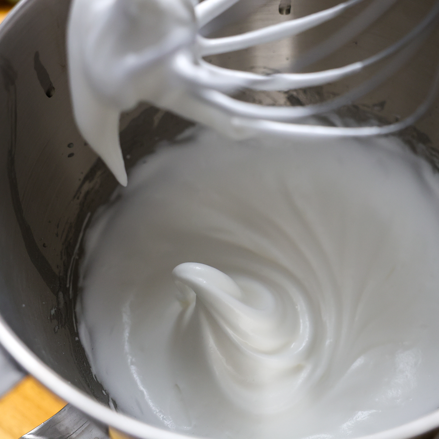 Stiff peak of the egg white mixture.