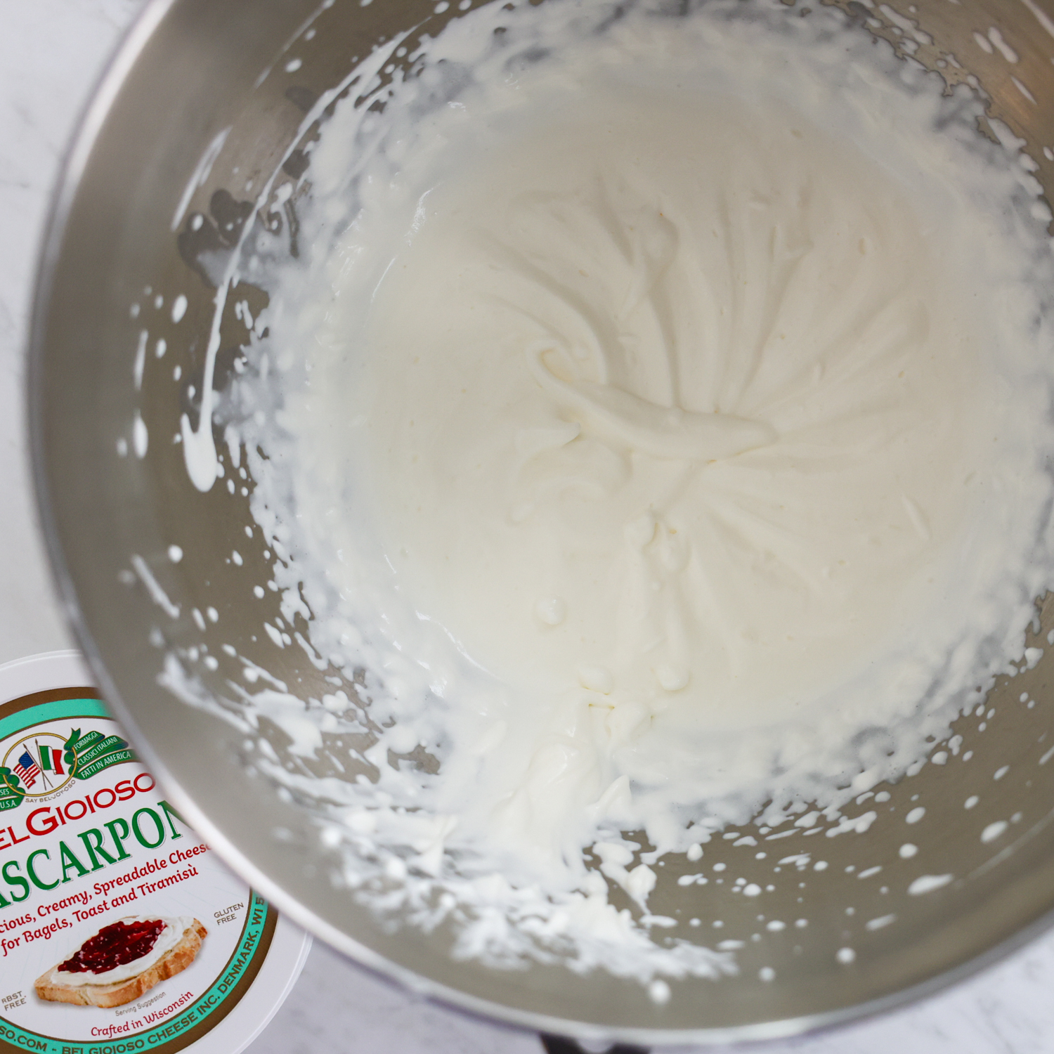 Heavy cream & mascarpone mixture in mixing bowl.