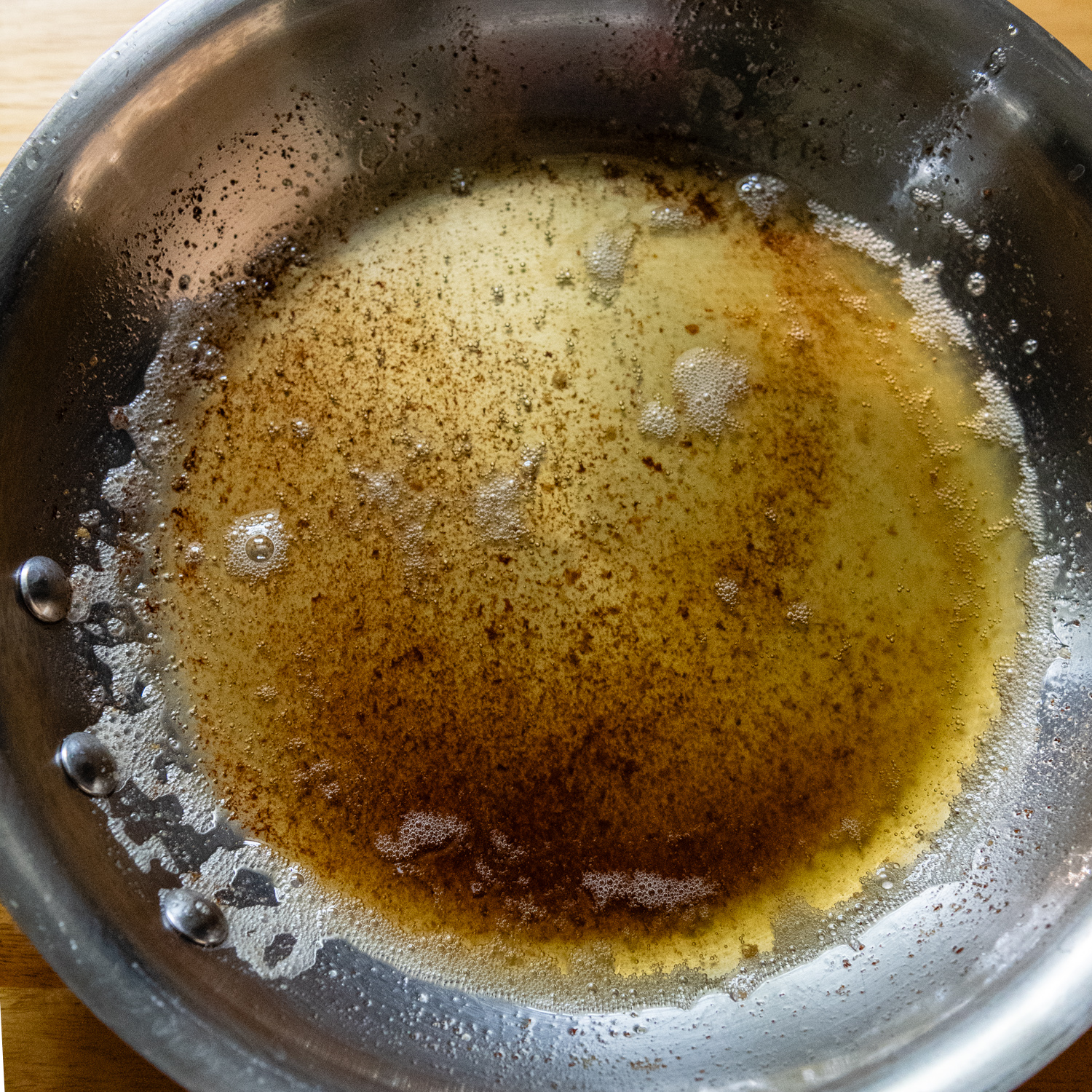 Browned butter in a pan.