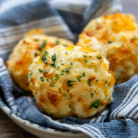 Basket of gluten free cheese biscuits.