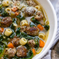Gluten Free Italian Wedding Soup in a white bowl.