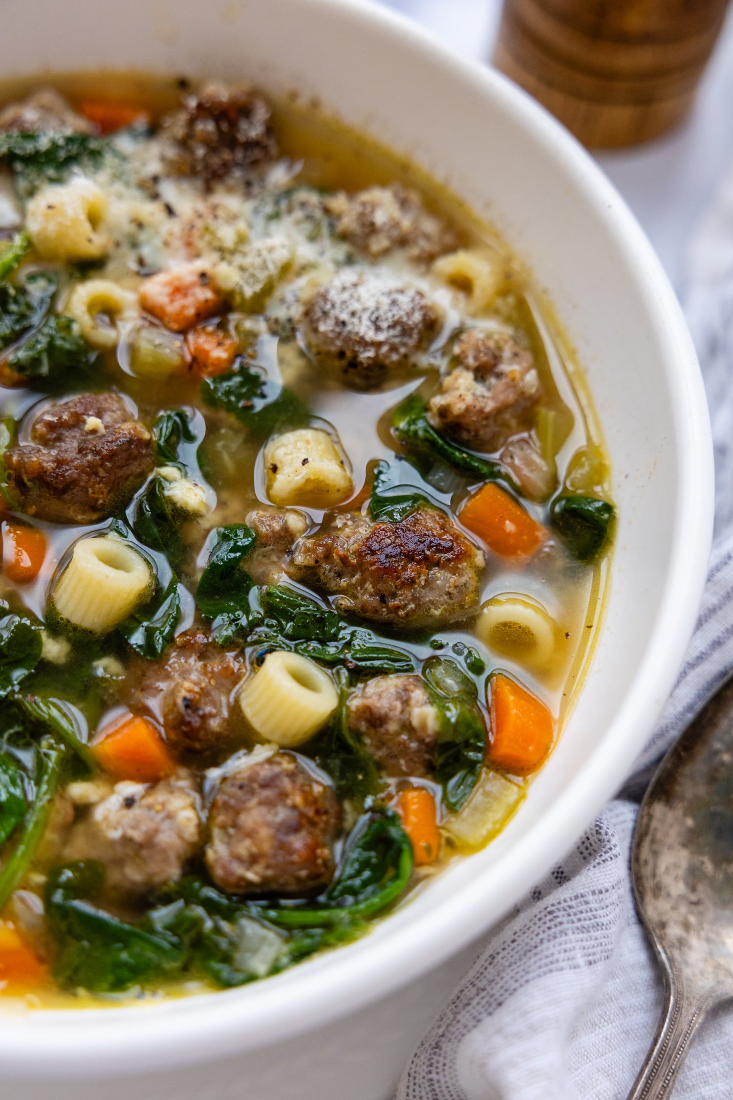 Gluten Free Italian Wedding Soup in a white bowl.