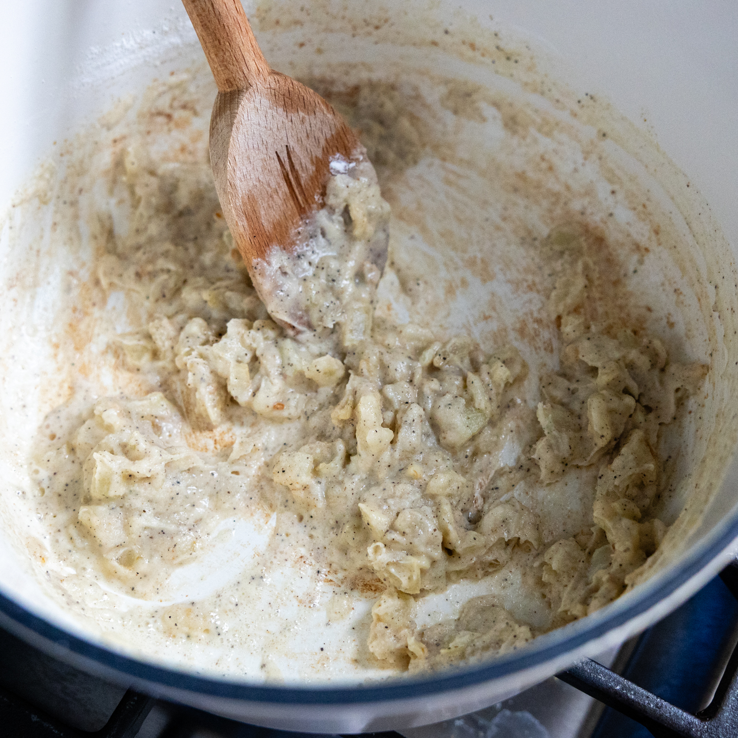Flour and butter ingredients combined in pan.