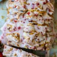 overhead shot of strawberry bread with strawberry glaze on top.