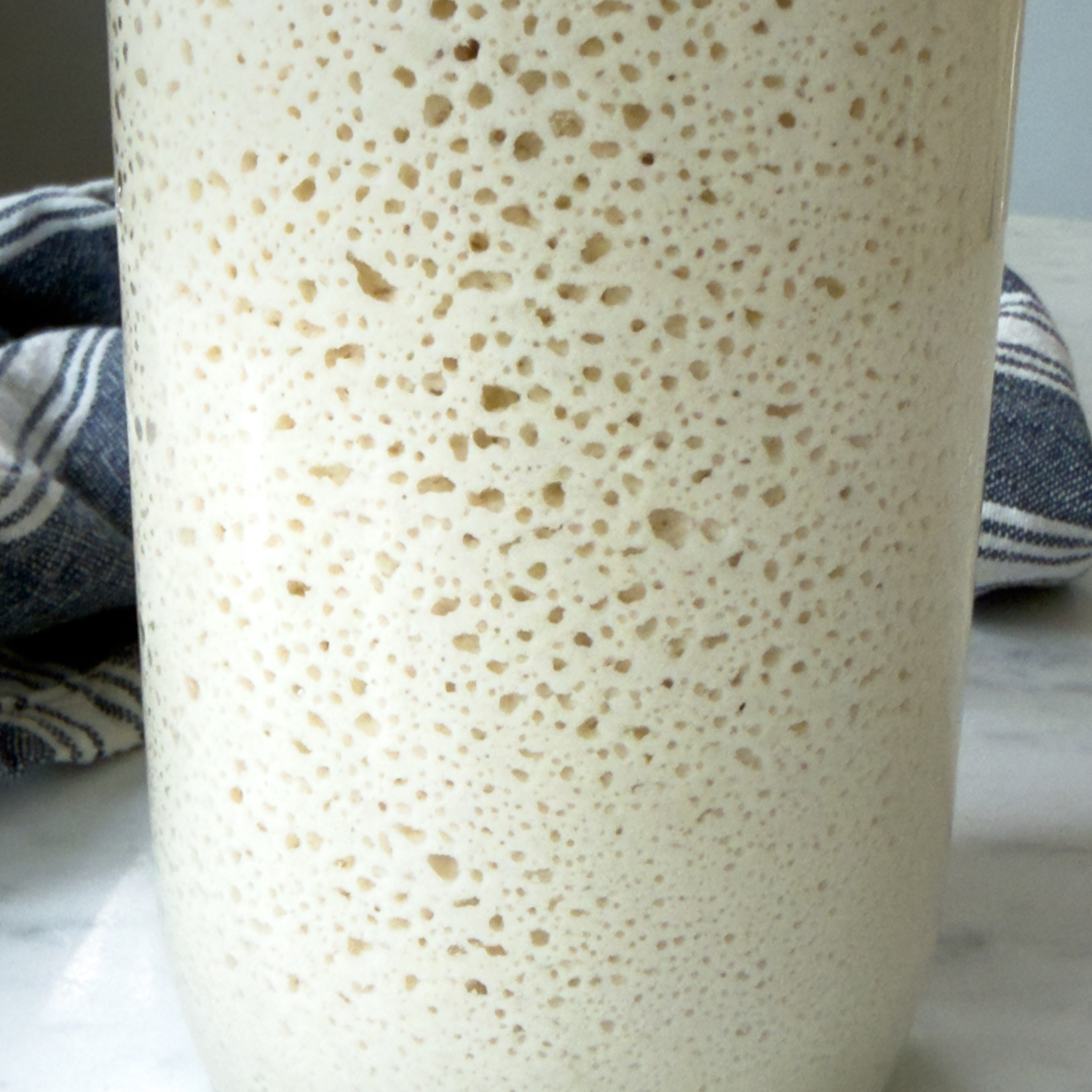 close up of the bubbles in the starter.