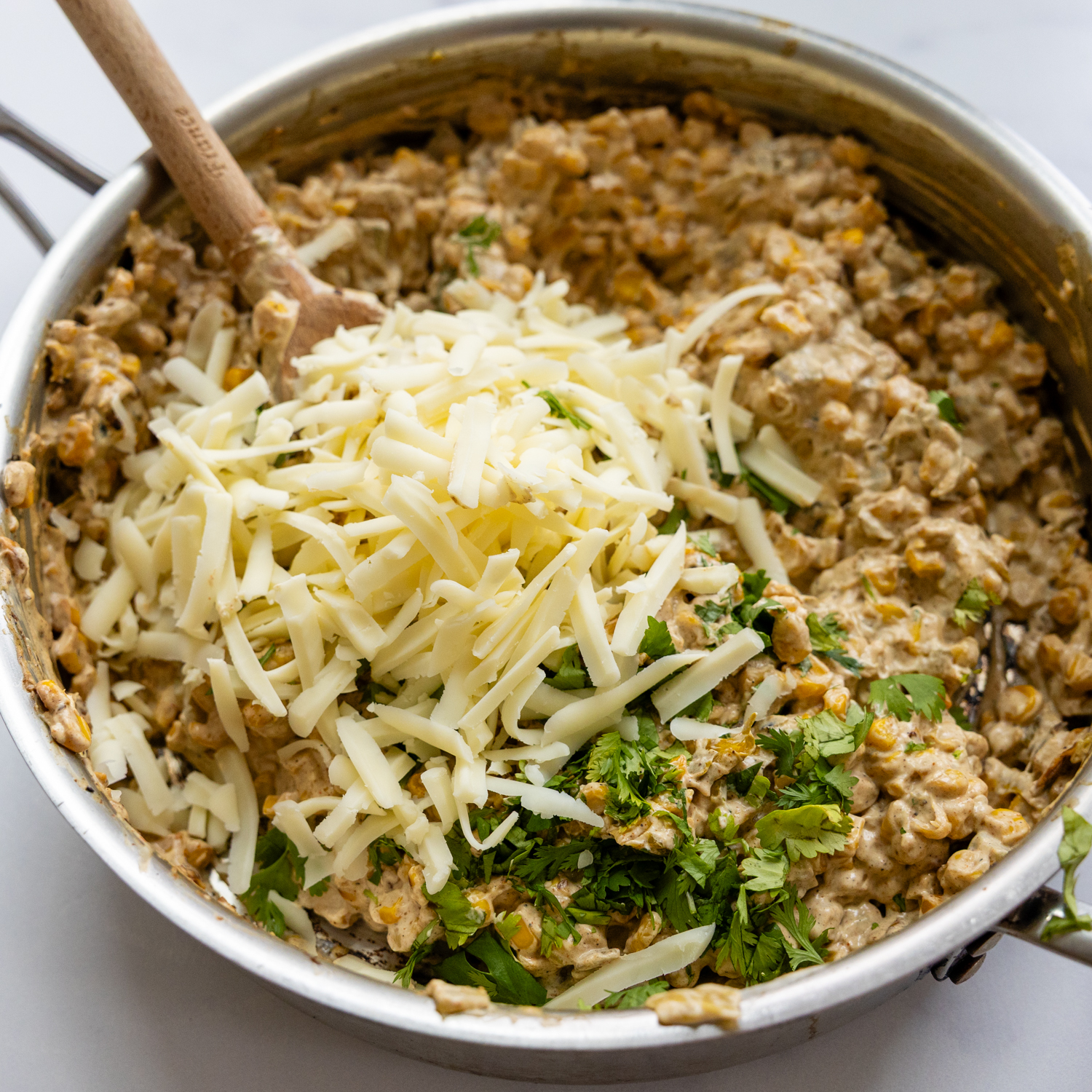 Remaining cheese added with the cilantro.